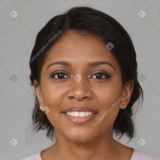 Joyful black young-adult female with medium  brown hair and brown eyes