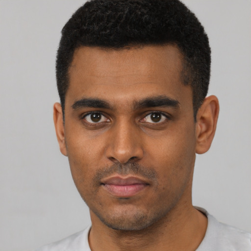 Neutral black young-adult male with short  black hair and brown eyes