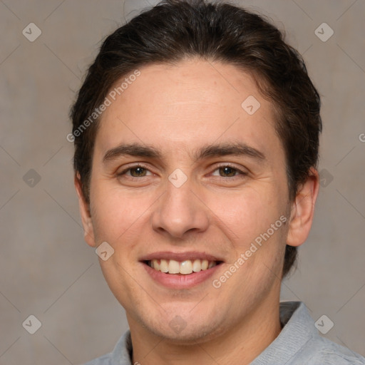 Joyful white young-adult male with short  brown hair and brown eyes