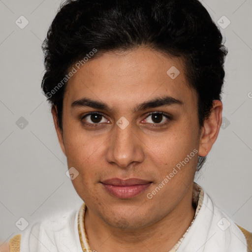 Joyful latino young-adult male with short  brown hair and brown eyes