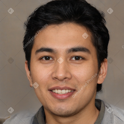 Joyful asian young-adult male with short  black hair and brown eyes