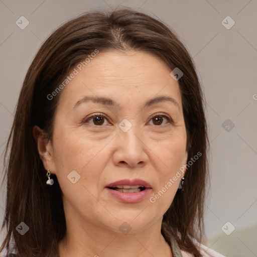 Joyful white adult female with medium  brown hair and brown eyes