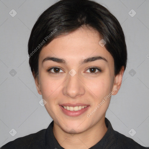 Joyful white young-adult female with short  black hair and brown eyes