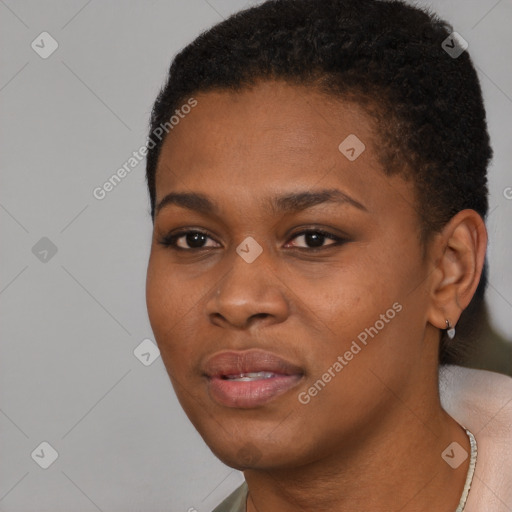 Joyful black young-adult female with short  black hair and brown eyes