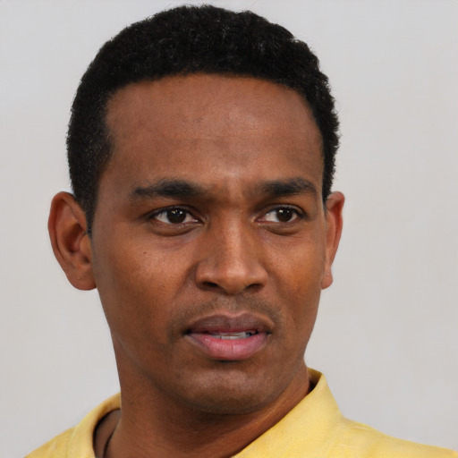 Neutral black young-adult male with short  black hair and brown eyes
