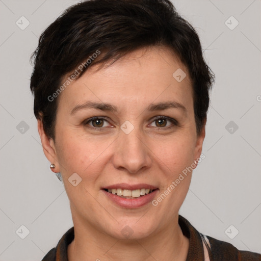 Joyful white adult female with short  brown hair and brown eyes