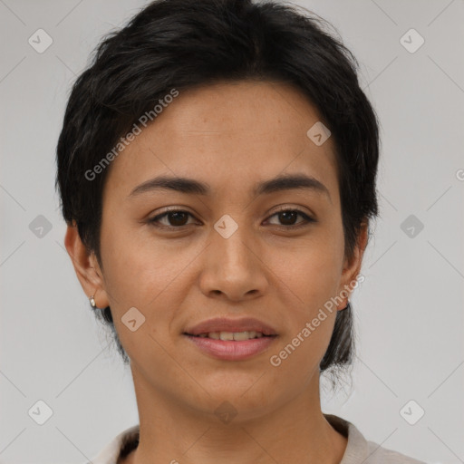 Joyful asian young-adult female with short  brown hair and brown eyes