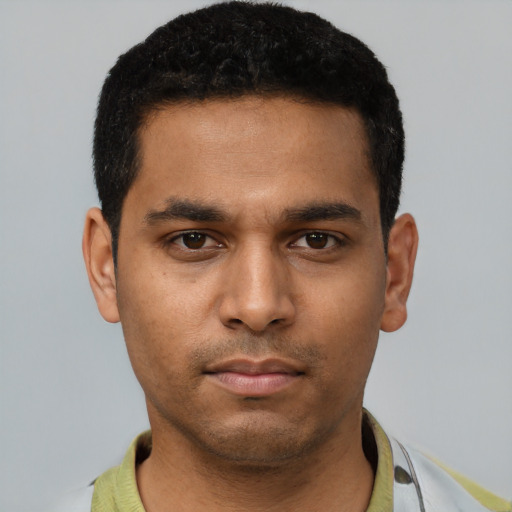 Neutral white young-adult male with short  black hair and brown eyes