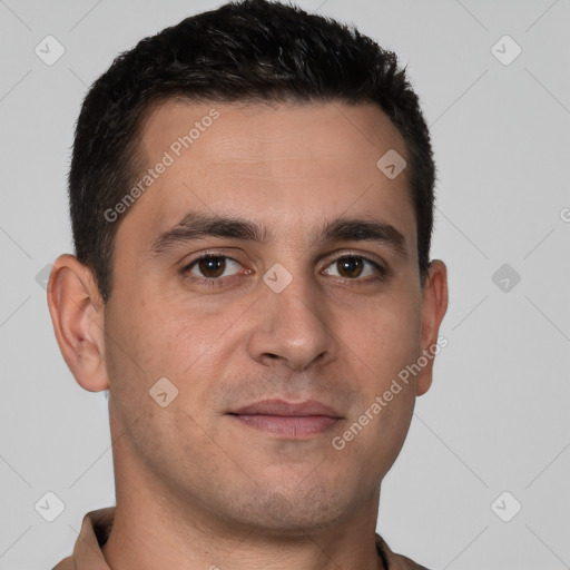 Joyful white young-adult male with short  brown hair and brown eyes