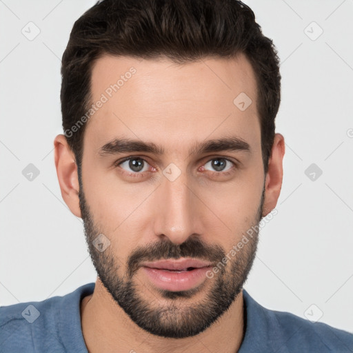 Joyful white young-adult male with short  black hair and brown eyes