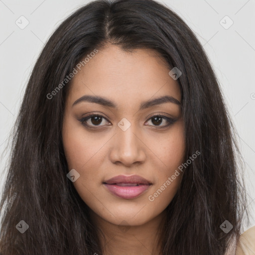 Joyful latino young-adult female with long  brown hair and brown eyes