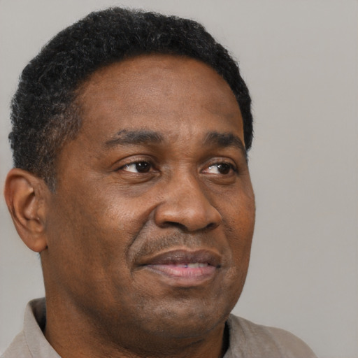 Neutral black adult male with short  brown hair and brown eyes