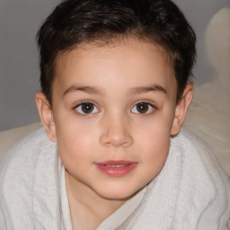 Joyful white child female with short  brown hair and brown eyes