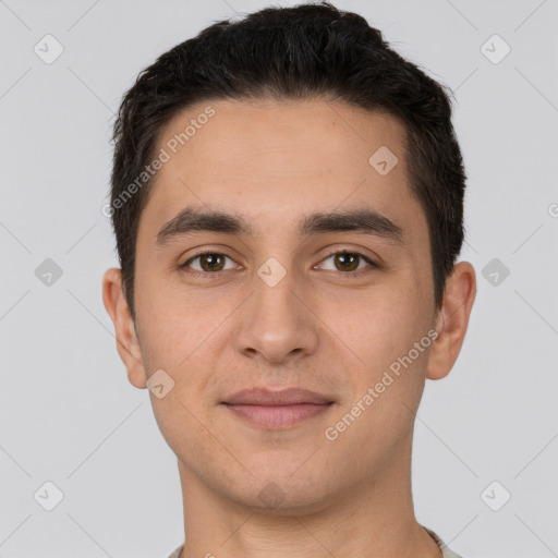 Joyful white young-adult male with short  brown hair and brown eyes