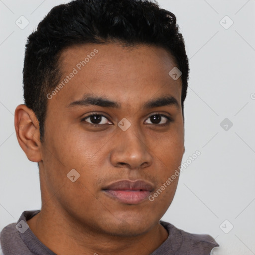 Neutral latino young-adult male with short  brown hair and brown eyes