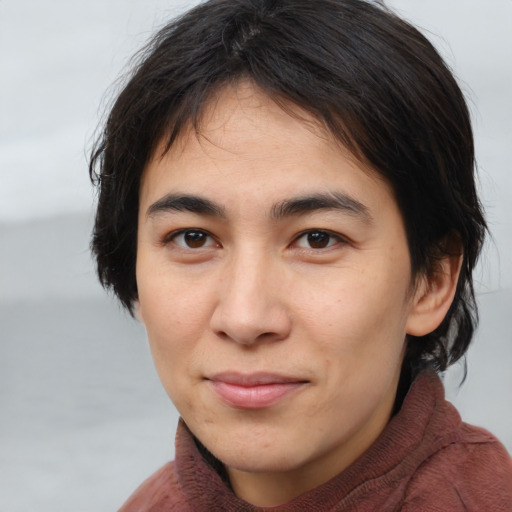 Joyful white young-adult male with medium  brown hair and brown eyes