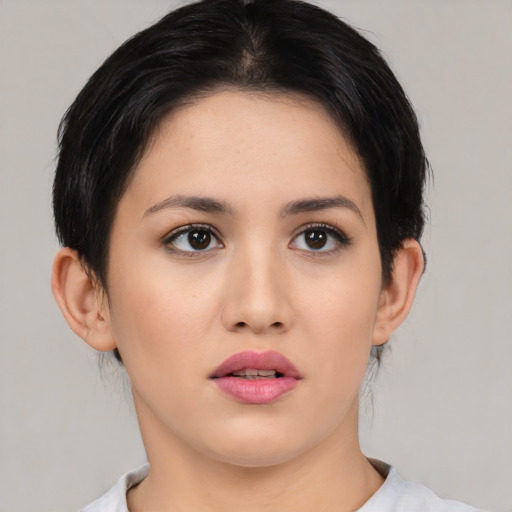 Neutral asian young-adult female with medium  black hair and brown eyes