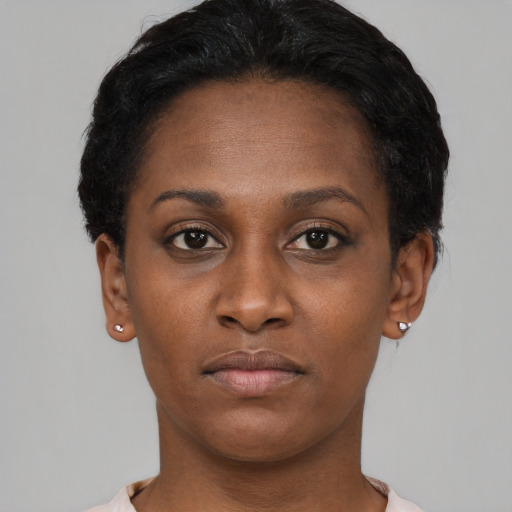 Neutral black young-adult female with short  black hair and brown eyes