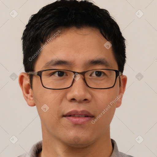 Neutral asian young-adult male with short  brown hair and brown eyes