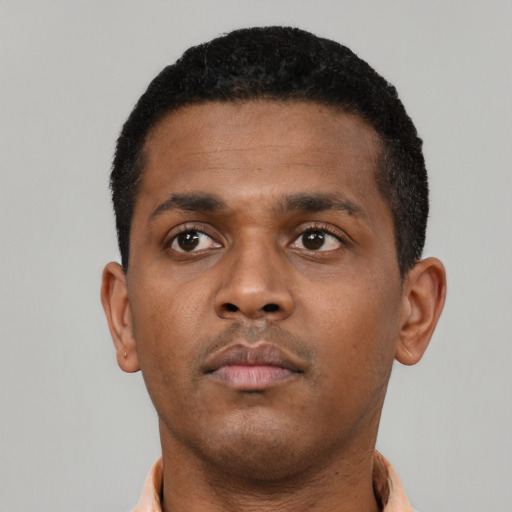 Neutral black young-adult male with short  black hair and brown eyes