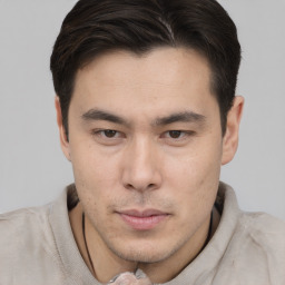 Neutral asian young-adult male with short  brown hair and brown eyes