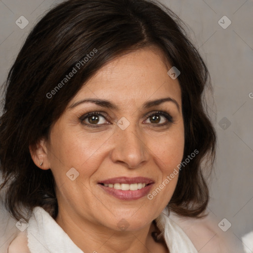 Joyful white adult female with medium  brown hair and brown eyes