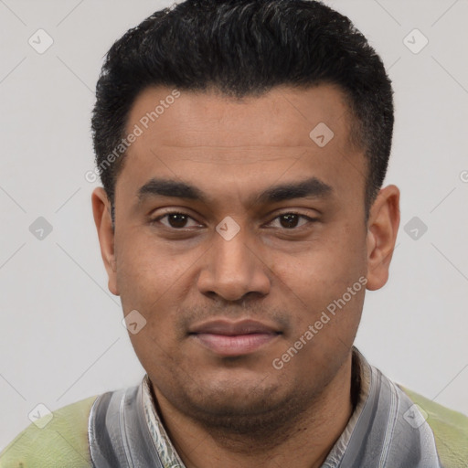 Joyful latino young-adult male with short  black hair and brown eyes