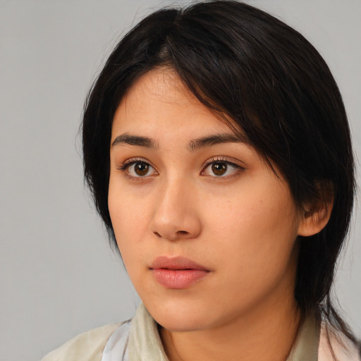 Neutral asian young-adult female with medium  black hair and brown eyes