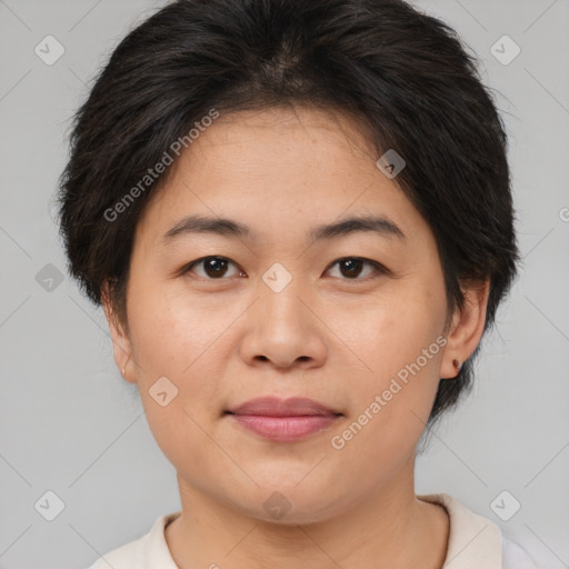 Joyful asian young-adult female with short  brown hair and brown eyes