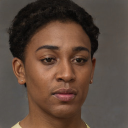 Neutral black young-adult female with short  brown hair and brown eyes