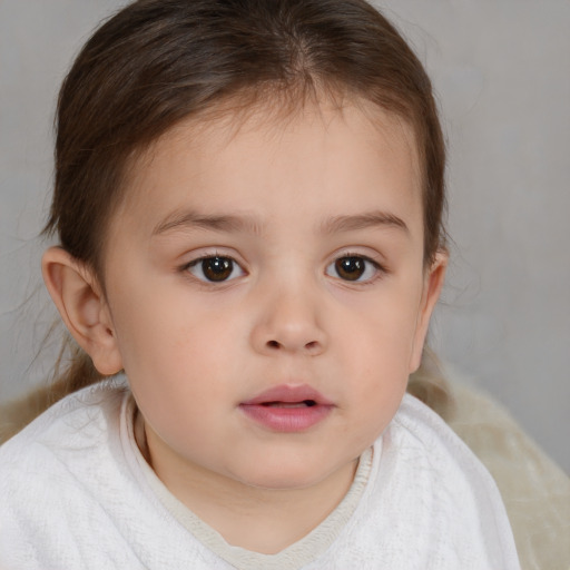 Neutral white child female with medium  brown hair and brown eyes