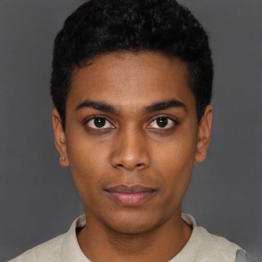 Neutral black young-adult male with short  black hair and brown eyes