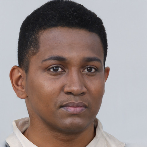 Neutral black young-adult male with short  brown hair and brown eyes