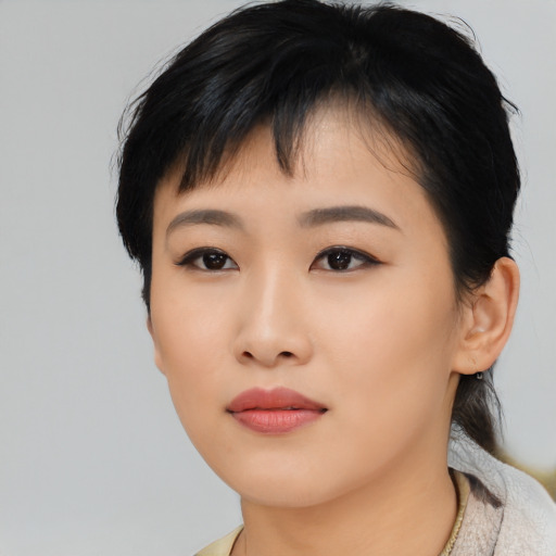 Neutral asian young-adult female with medium  black hair and brown eyes
