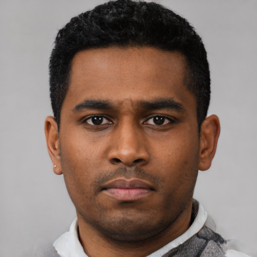 Neutral latino young-adult male with short  black hair and brown eyes