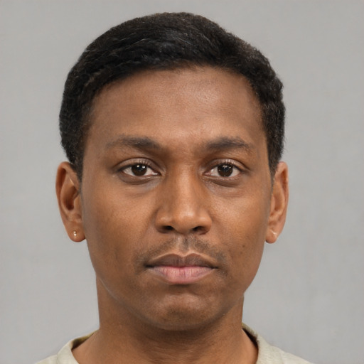 Neutral black young-adult male with short  brown hair and brown eyes