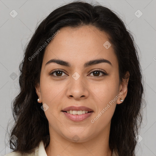 Joyful latino young-adult female with long  brown hair and brown eyes