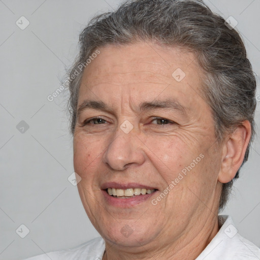 Joyful white middle-aged male with short  brown hair and brown eyes