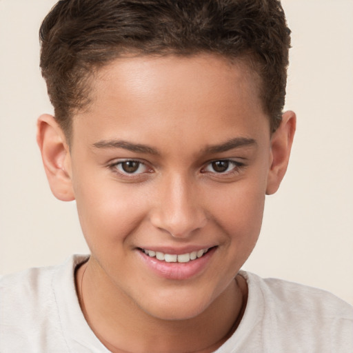 Joyful white child male with short  brown hair and brown eyes