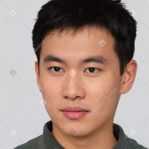 Neutral asian young-adult male with short  brown hair and brown eyes