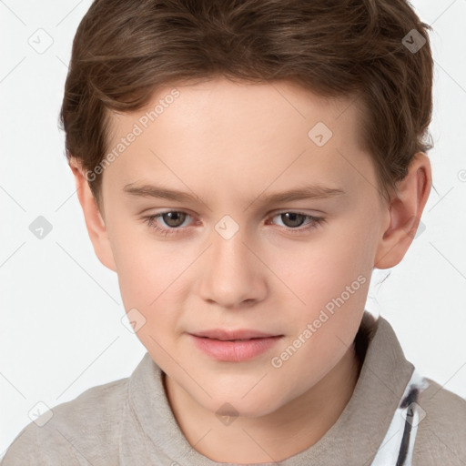 Joyful white child male with short  brown hair and brown eyes