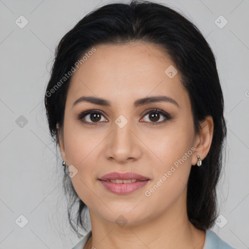 Joyful latino young-adult female with medium  black hair and brown eyes