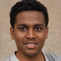 Joyful latino young-adult male with short  brown hair and brown eyes