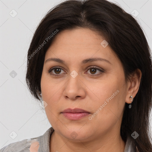 Joyful white adult female with medium  brown hair and brown eyes