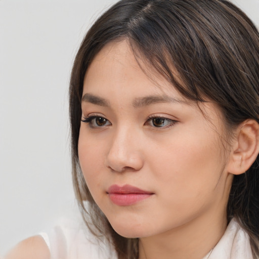Neutral white young-adult female with medium  brown hair and brown eyes