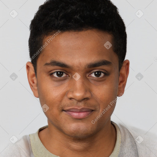 Joyful black young-adult male with short  brown hair and brown eyes