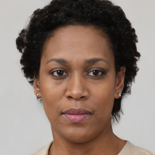 Neutral black young-adult female with short  black hair and brown eyes