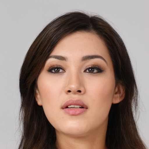 Neutral asian young-adult female with long  brown hair and brown eyes