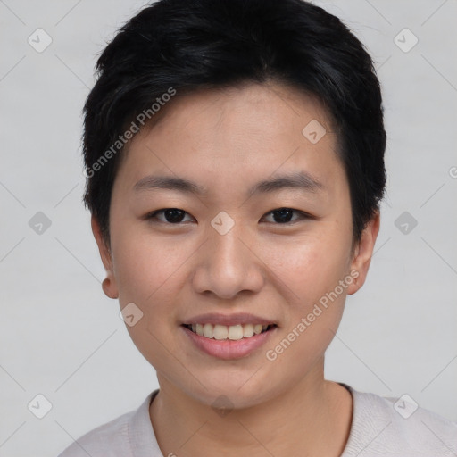 Joyful asian young-adult female with short  brown hair and brown eyes