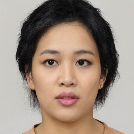 Neutral asian young-adult female with medium  black hair and brown eyes